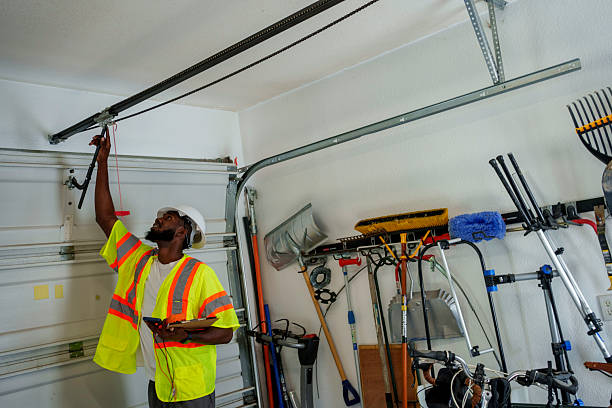 Professional Garage Door Panel Replacement technician working in Asbury, IA